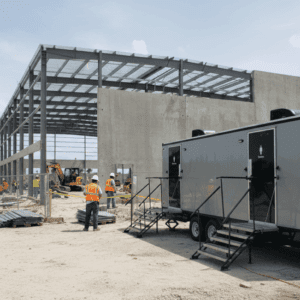 Luxury portable restroom trailer rental for construction site in Miami – YML